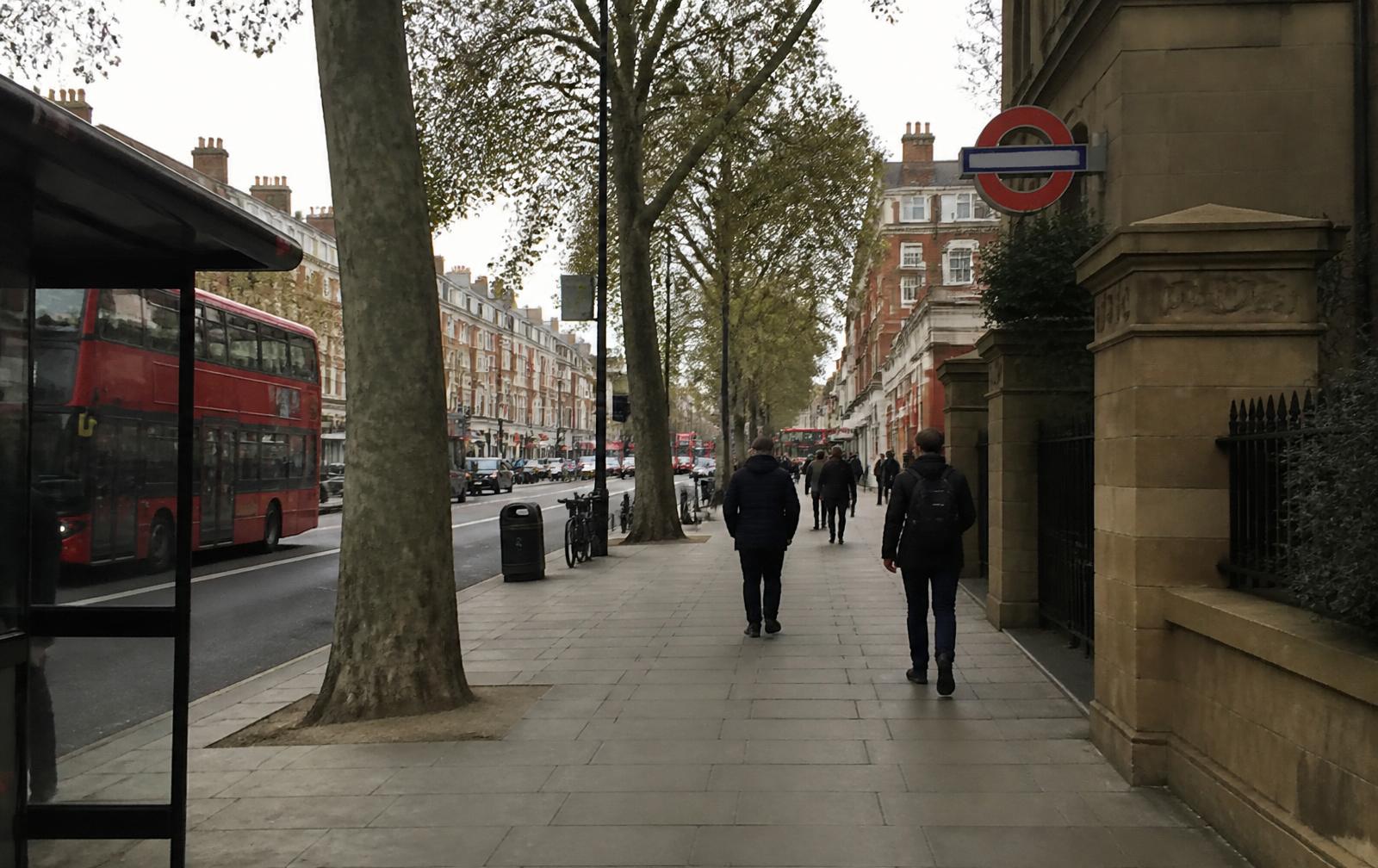 Street-level view of a south-west London high street near an Underground station